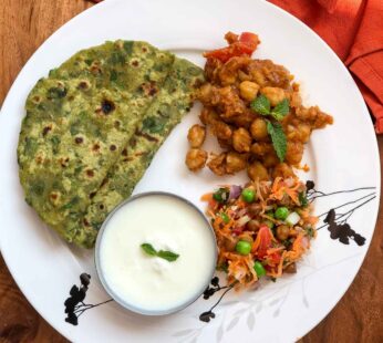 Palak paratha with chole or omelette pickle on side with karak tea